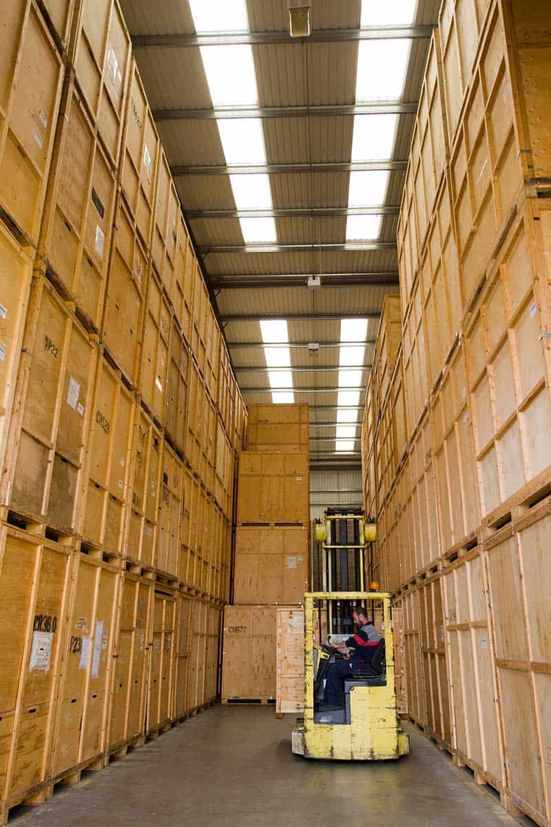 Wooden storage containers stacked in the warehouse